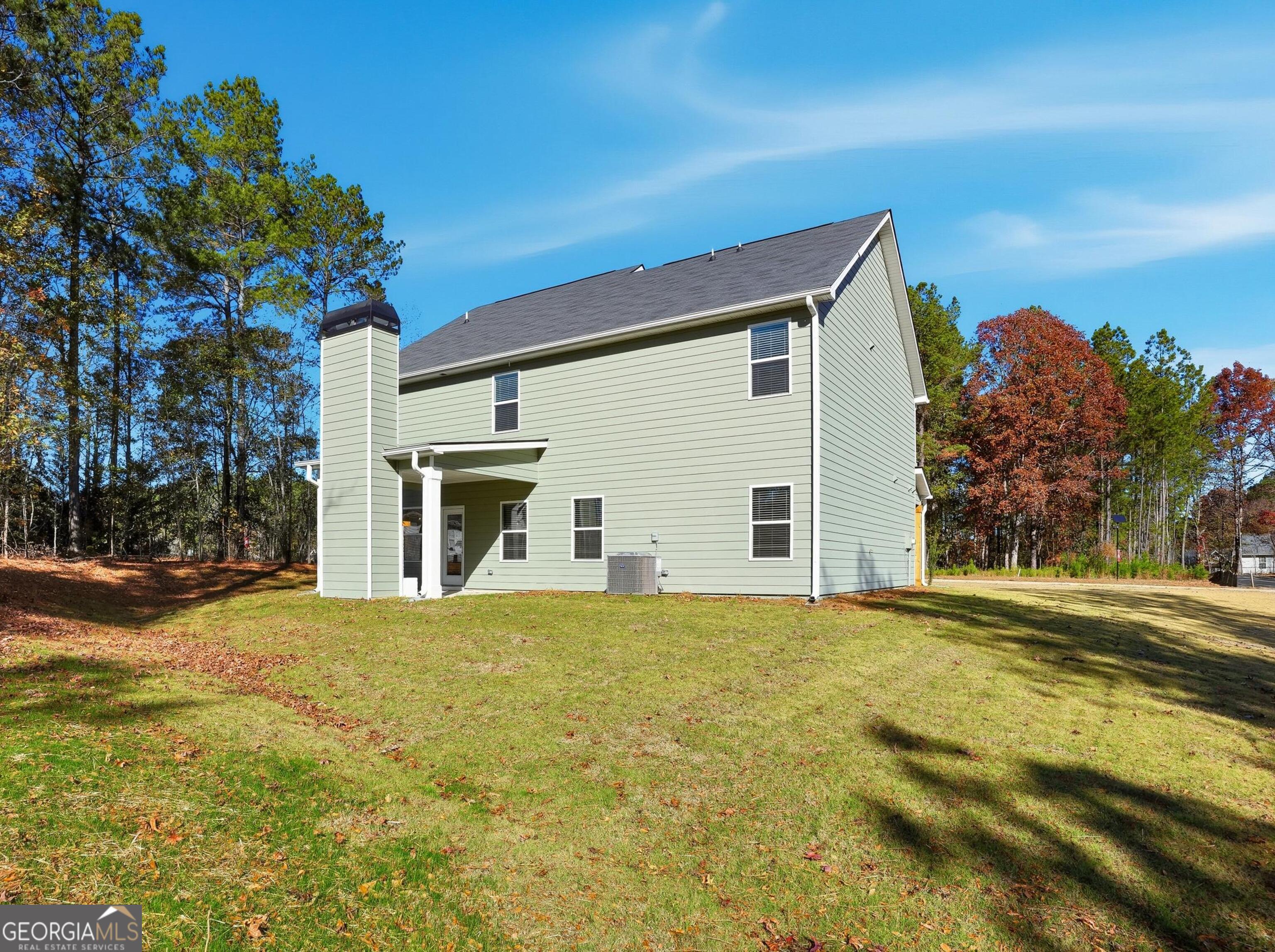 130 Post Oak Drive, Unit 130 Jackson, GA 30233 - Photo 29 of 29 a view of a house with a yard