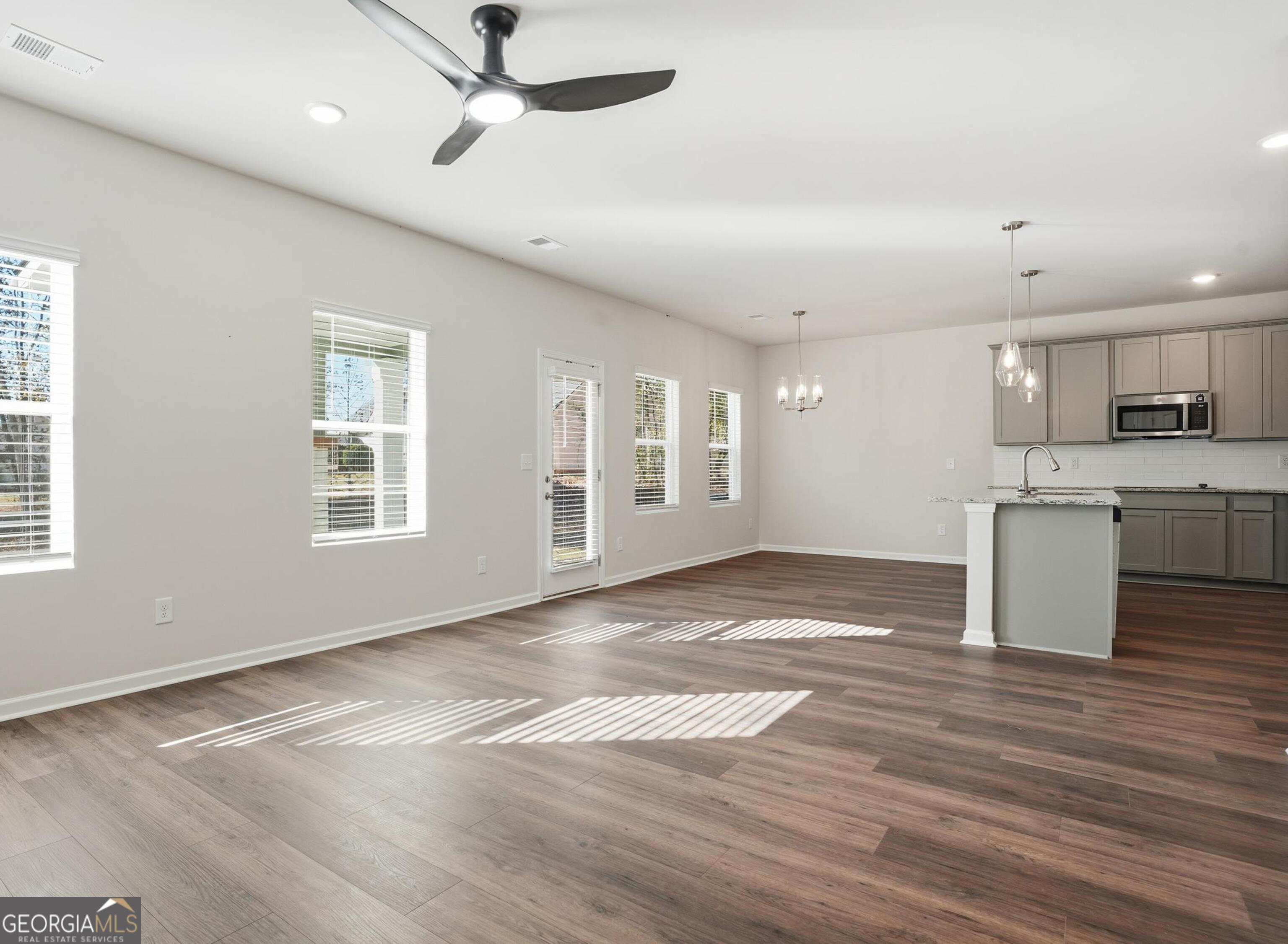 130 Post Oak Drive, Unit 130 Jackson, GA 30233 - Photo 4 of 29 a view of a kitchen with a sink and a window