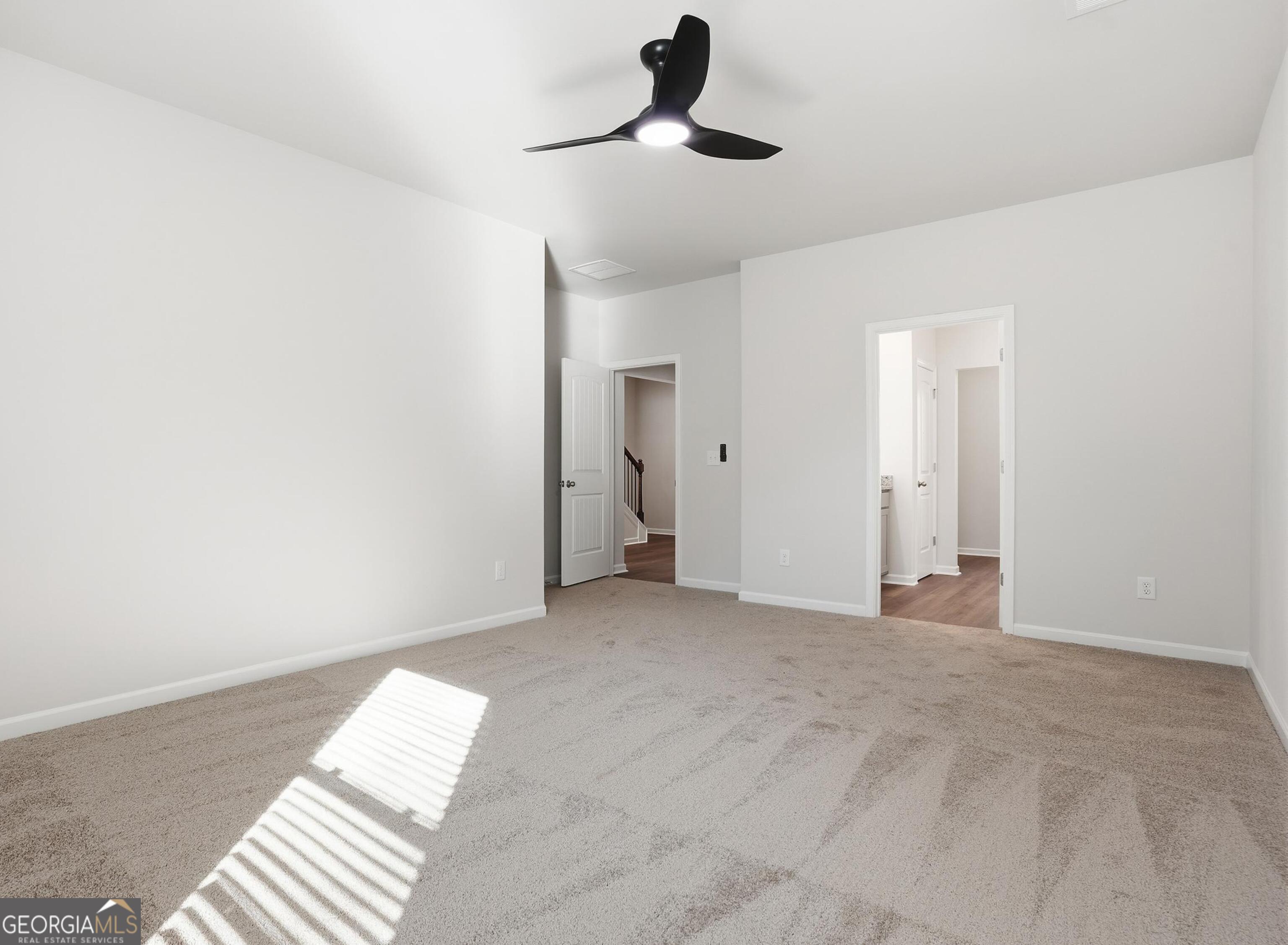 130 Post Oak Drive, Unit 130 Jackson, GA 30233 - Photo 9 of 29 a view of empty room with ceiling fan