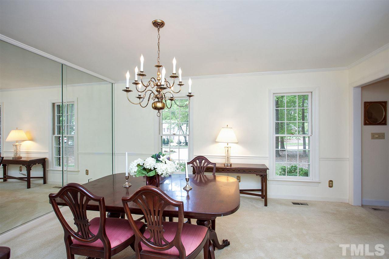 903 Queensferry Road Cary, NC 27511 - Photo 12 of 25 Elegant dining with mirrored wall to reflect candlelight dining.
