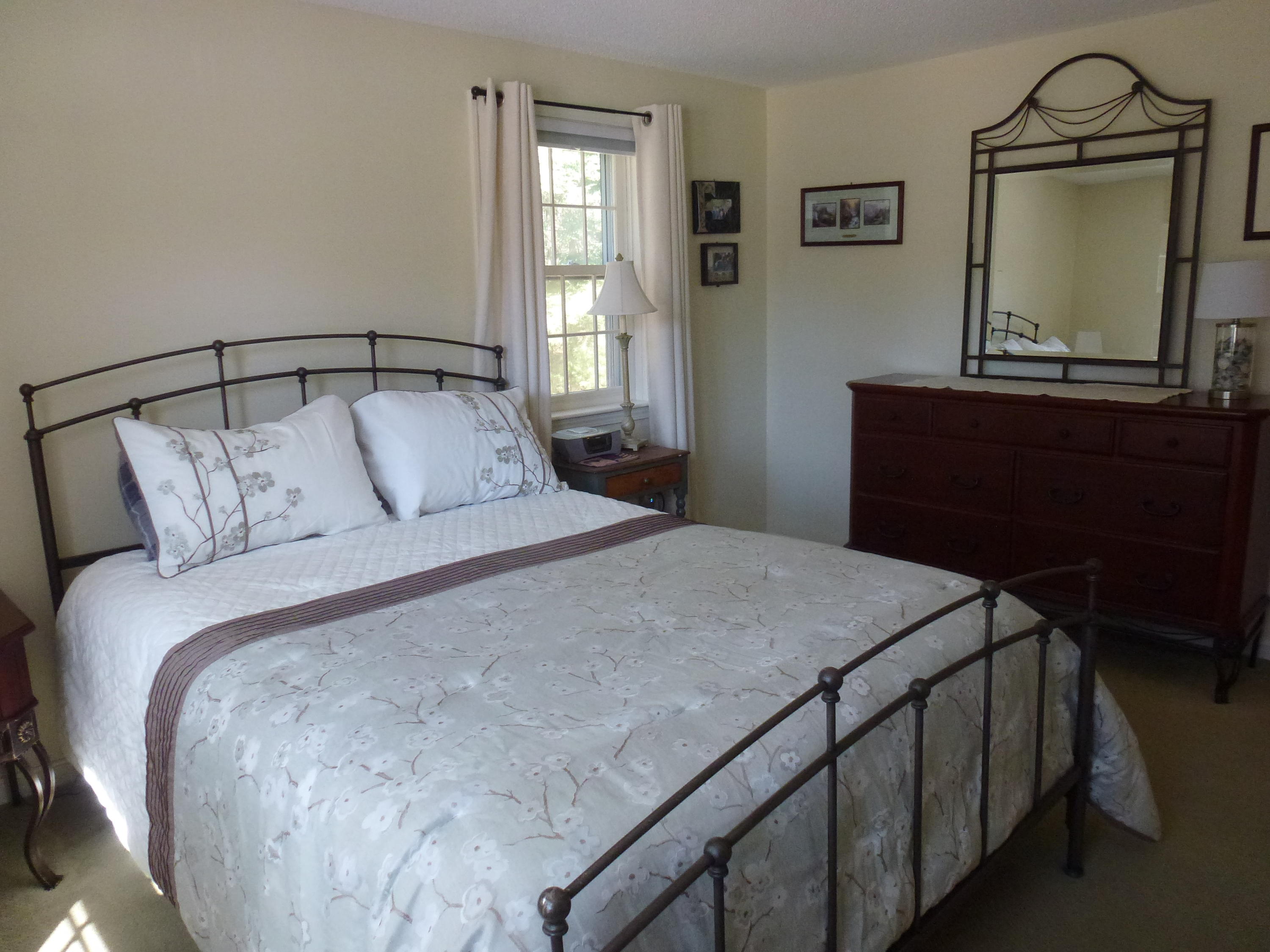 231 Flintlock Village Road, Unit 1 Wells, ME 04090 - Photo 23 of 30 1 st Floor Master Bedroom