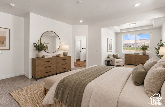 2503 North Scarlet Road, Unit 252 Eagle Mountain, UT 84005 - Photo 9 of 17 Recessed lighting, tray ceiling, large windows, and wall-to-wall carpeting