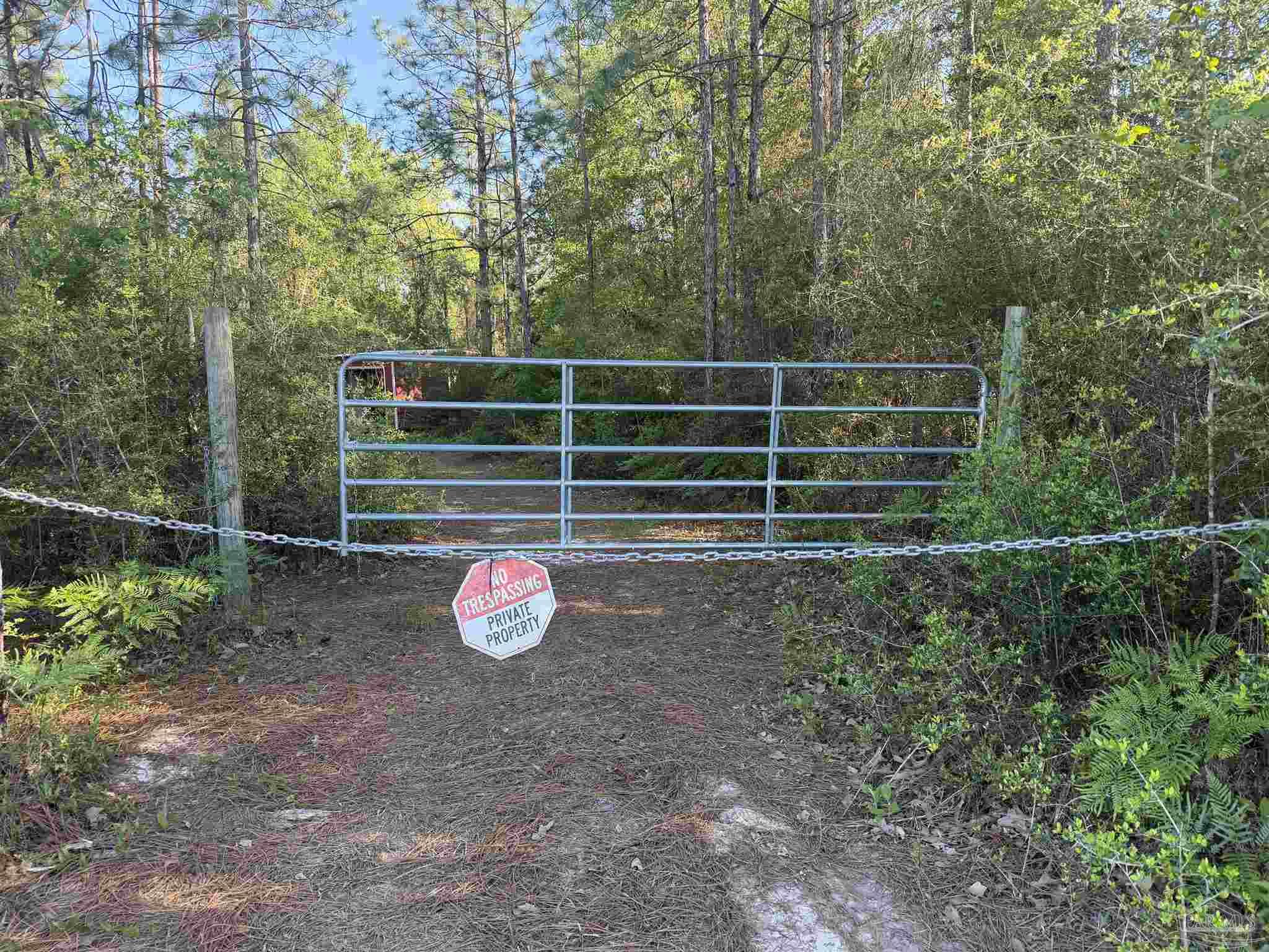 0 Whitfield Road Milton, FL 32570 - Photo 20 of 20 a view of a door and a wooden fence