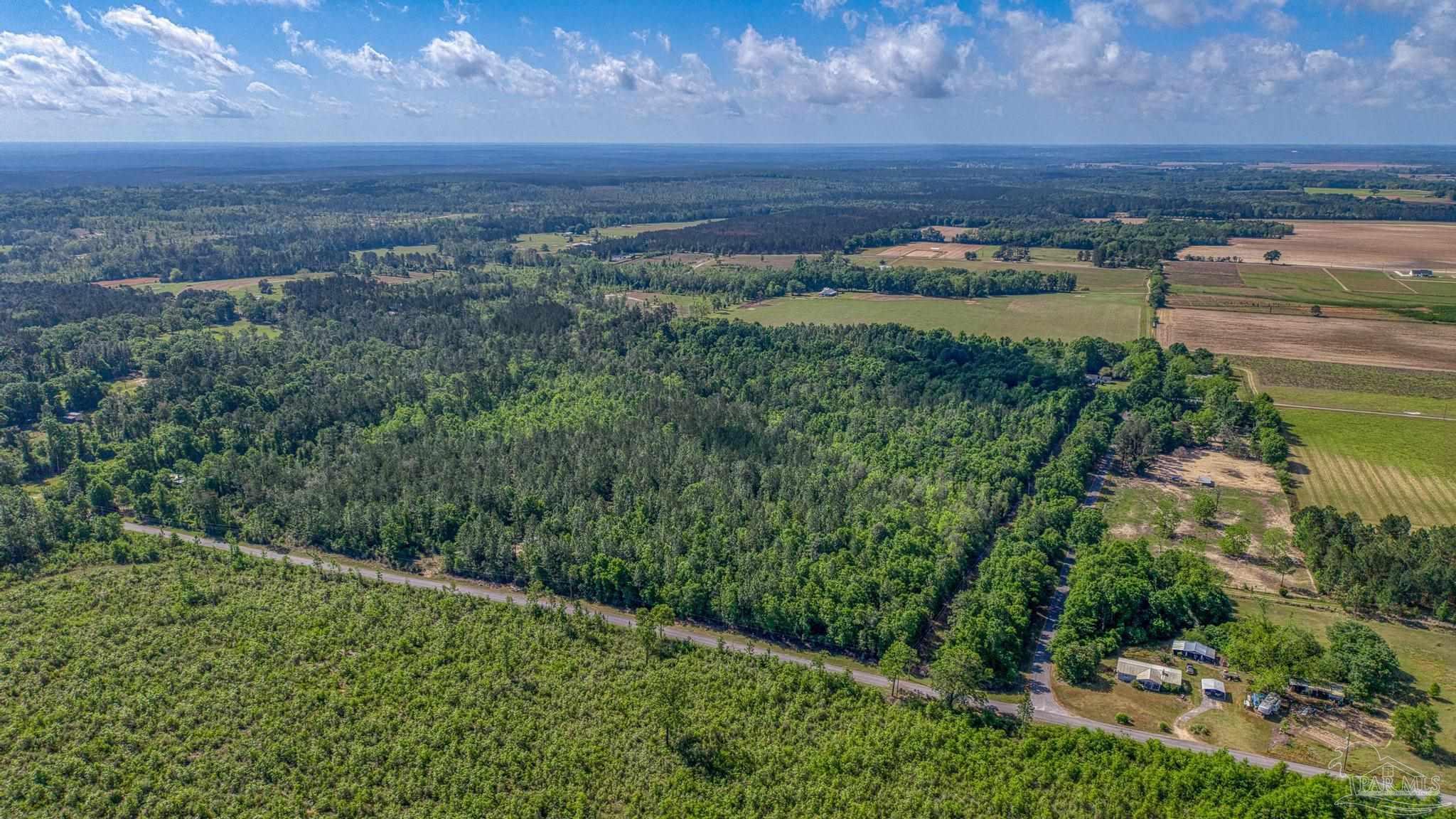 0 Whitfield Road Milton, FL 32570 - Photo 3 of 20 a view of a field with an ocean