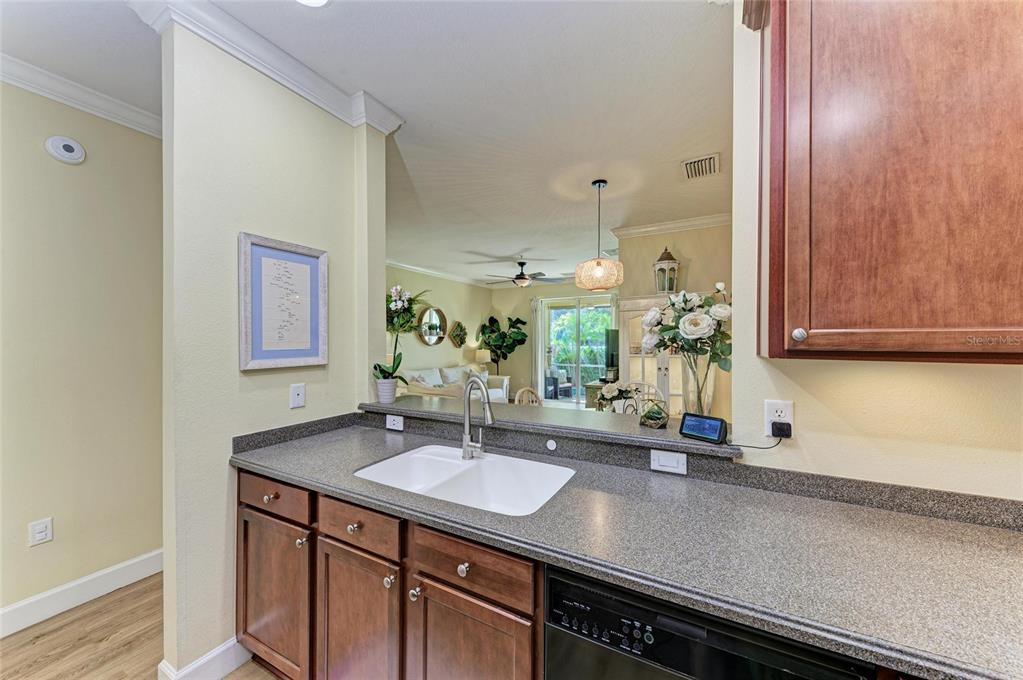 8015 Limestone Lane, Unit 15101 Sarasota, FL 34233 - Photo 18 of 46 a bathroom with a sink and a mirror