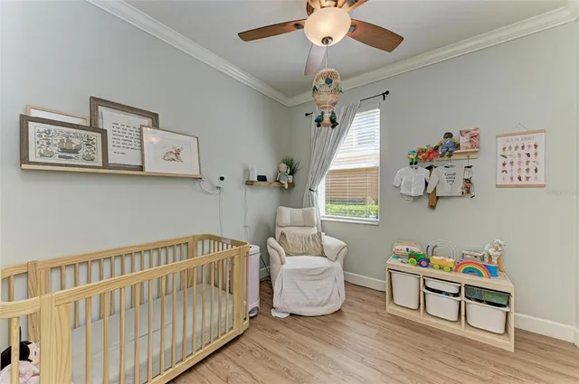 a bedroom with furniture and a window