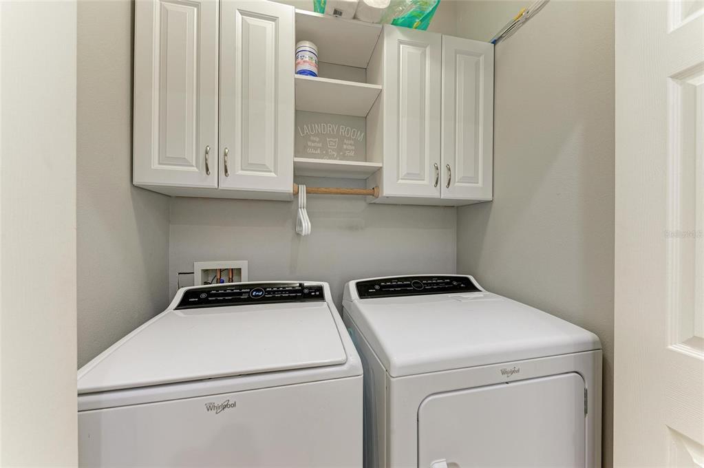 8015 Limestone Lane, Unit 15101 Sarasota, FL 34233 - Photo 29 of 46 a utility room with dryer and washer