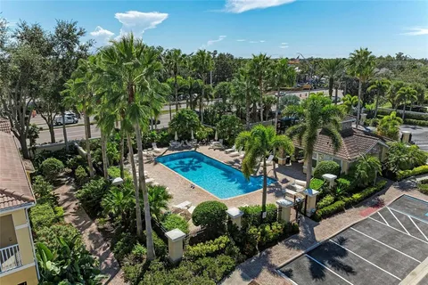 a view of a swimming pool with a patio