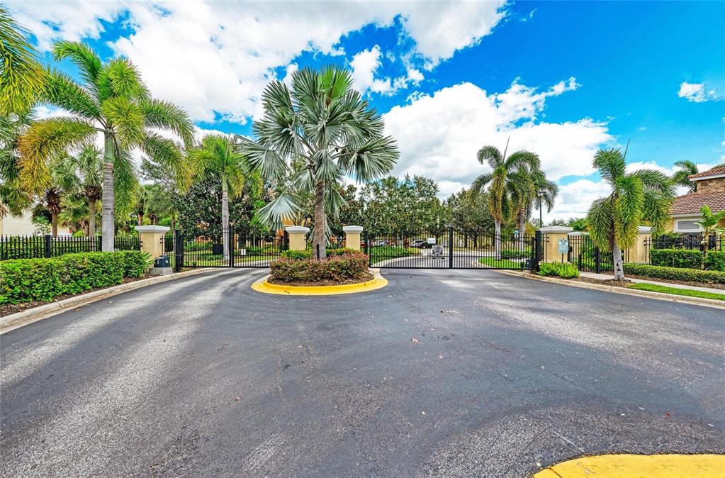 8015 Limestone Lane, Unit 15101 Sarasota, FL 34233 - Photo 44 of 46 a view of a park with swings and slides