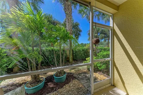 a view of a small filled with furniture