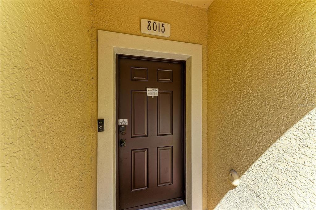 8015 Limestone Lane, Unit 15101 Sarasota, FL 34233 - Photo 7 of 46 a view of front door of a house