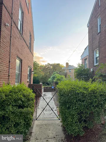 a view of a terrace with a garden and stairs