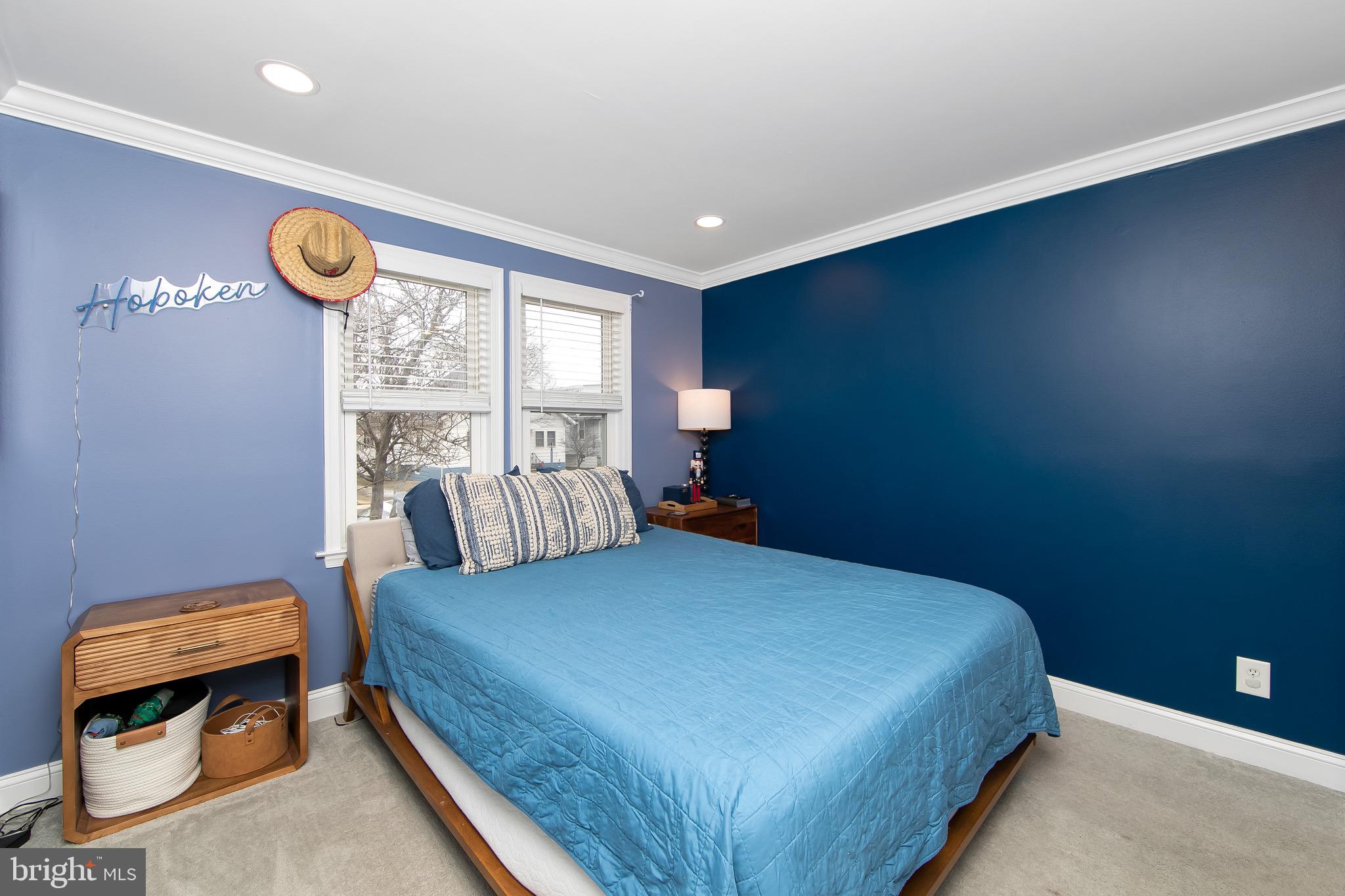 22 West 6th Avenue Runnemede, NJ 08078 - Photo 15 of 33 a bedroom with a bed and a lamp