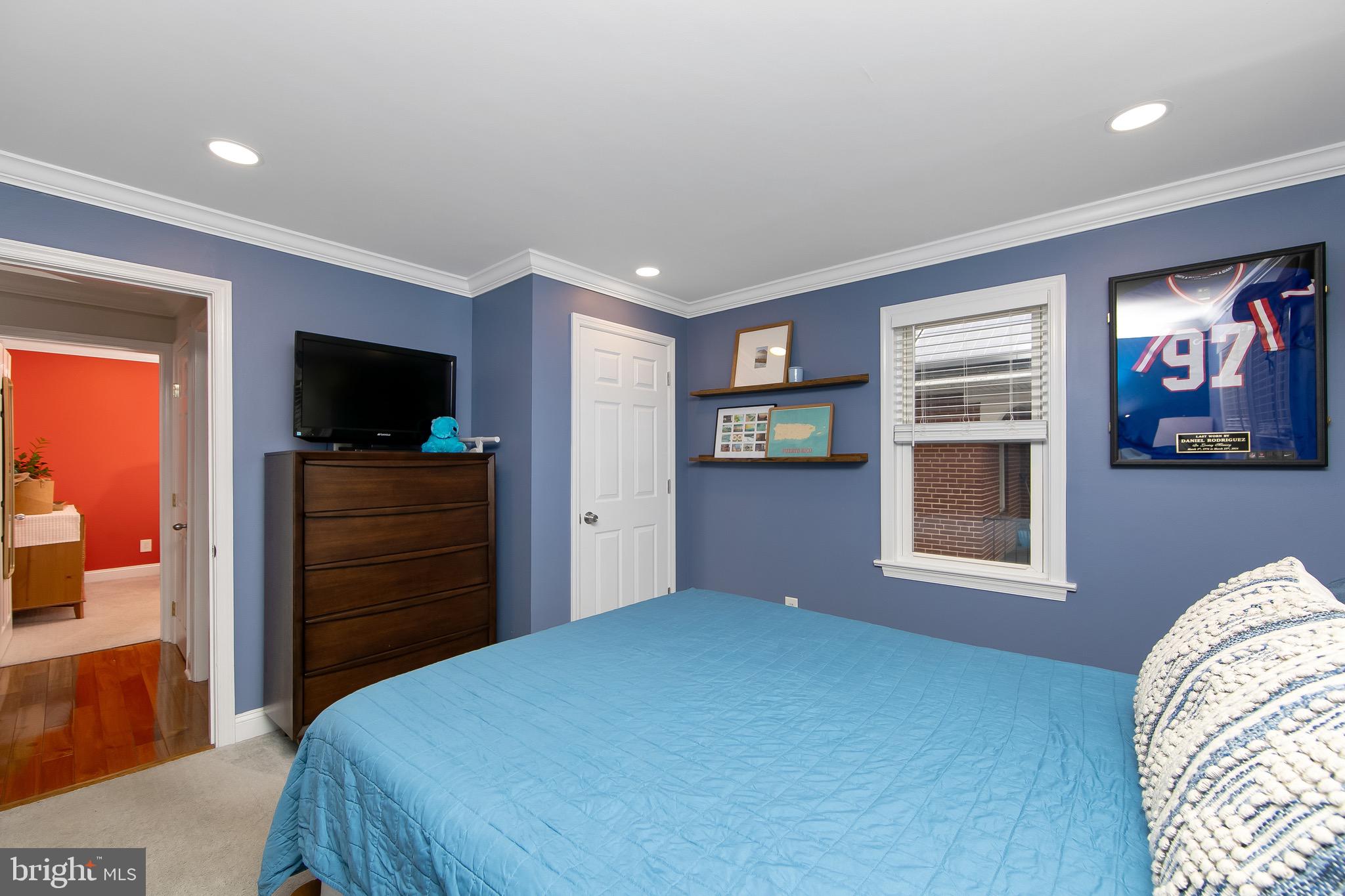 22 West 6th Avenue Runnemede, NJ 08078 - Photo 16 of 33 a bedroom with a bed and a flat screen tv