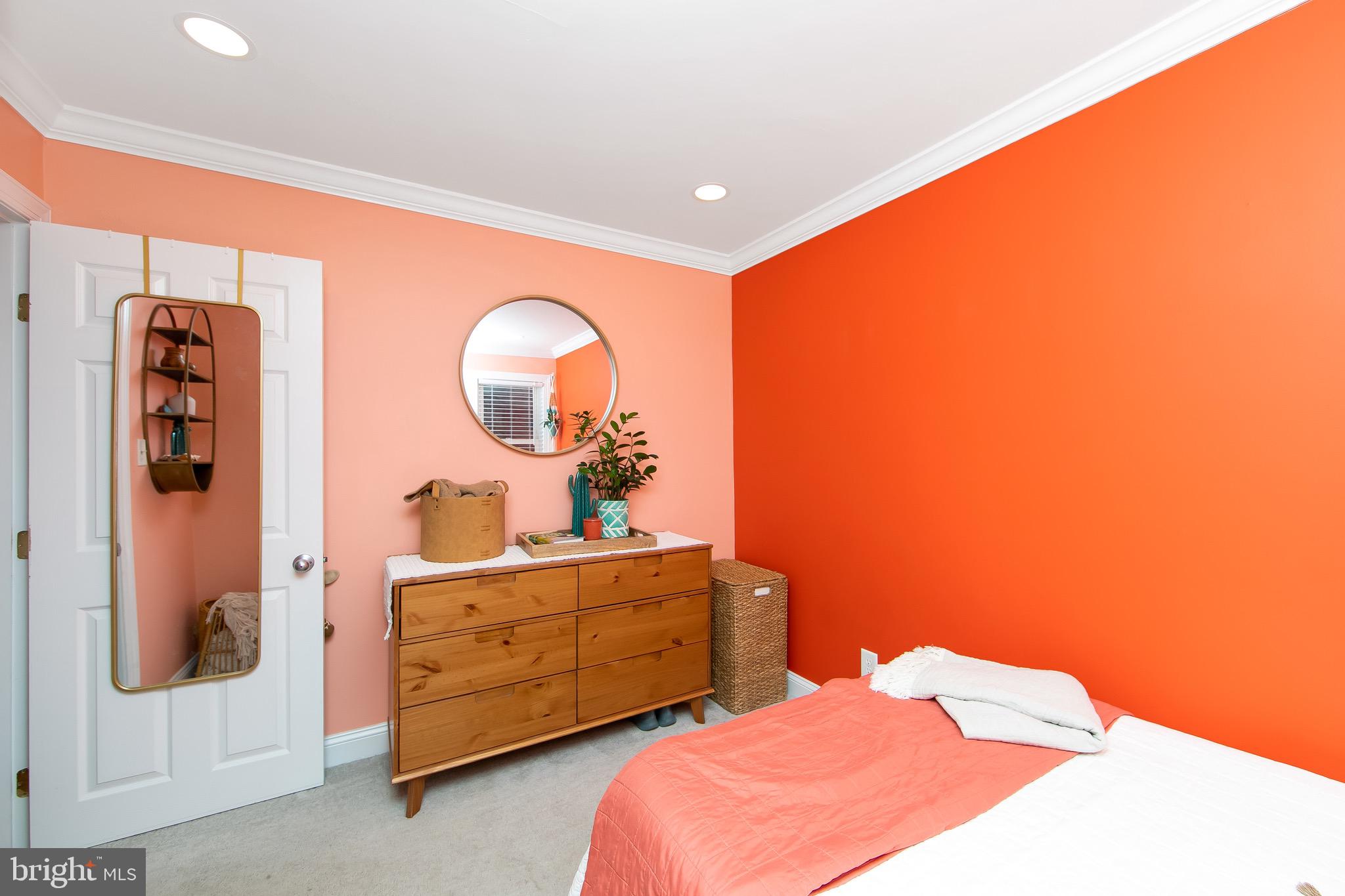 22 West 6th Avenue Runnemede, NJ 08078 - Photo 19 of 33 a bedroom with a bed and a dresser