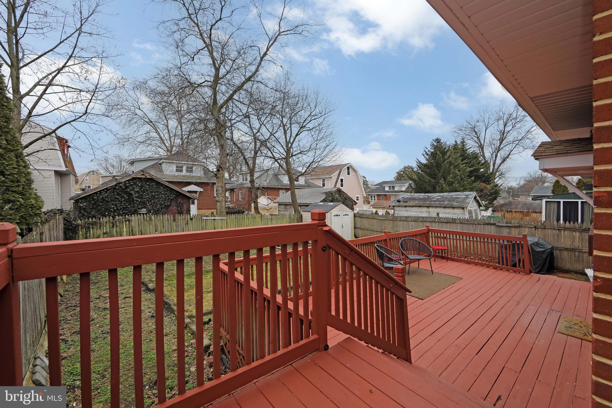 22 West 6th Avenue Runnemede, NJ 08078 - Photo 29 of 33 a balcony with wooden floor and outdoor seating