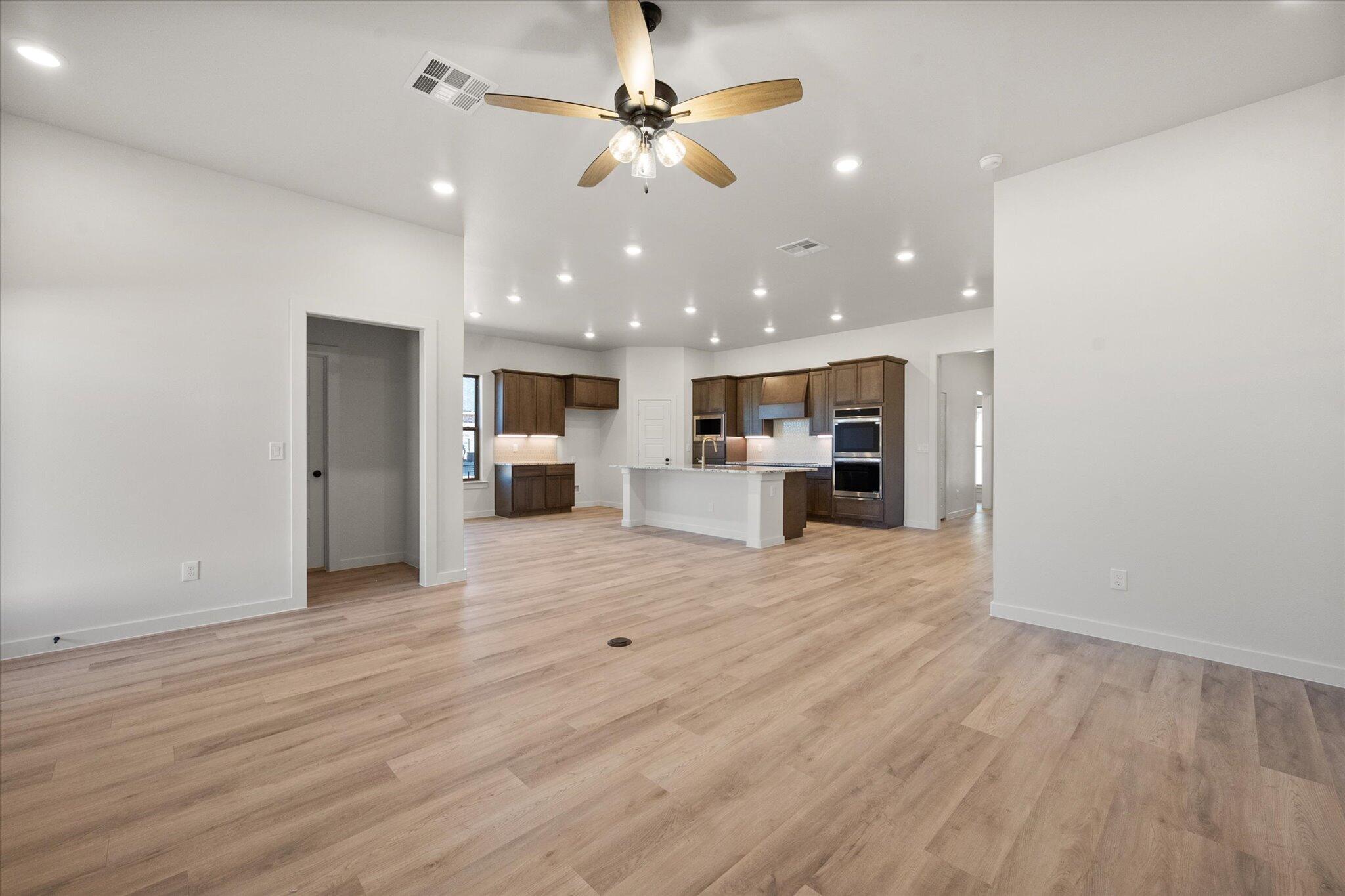 7010 16th Street Lubbock, TX 79416 - Photo 13 of 28 a view of kitchen and refrigerator