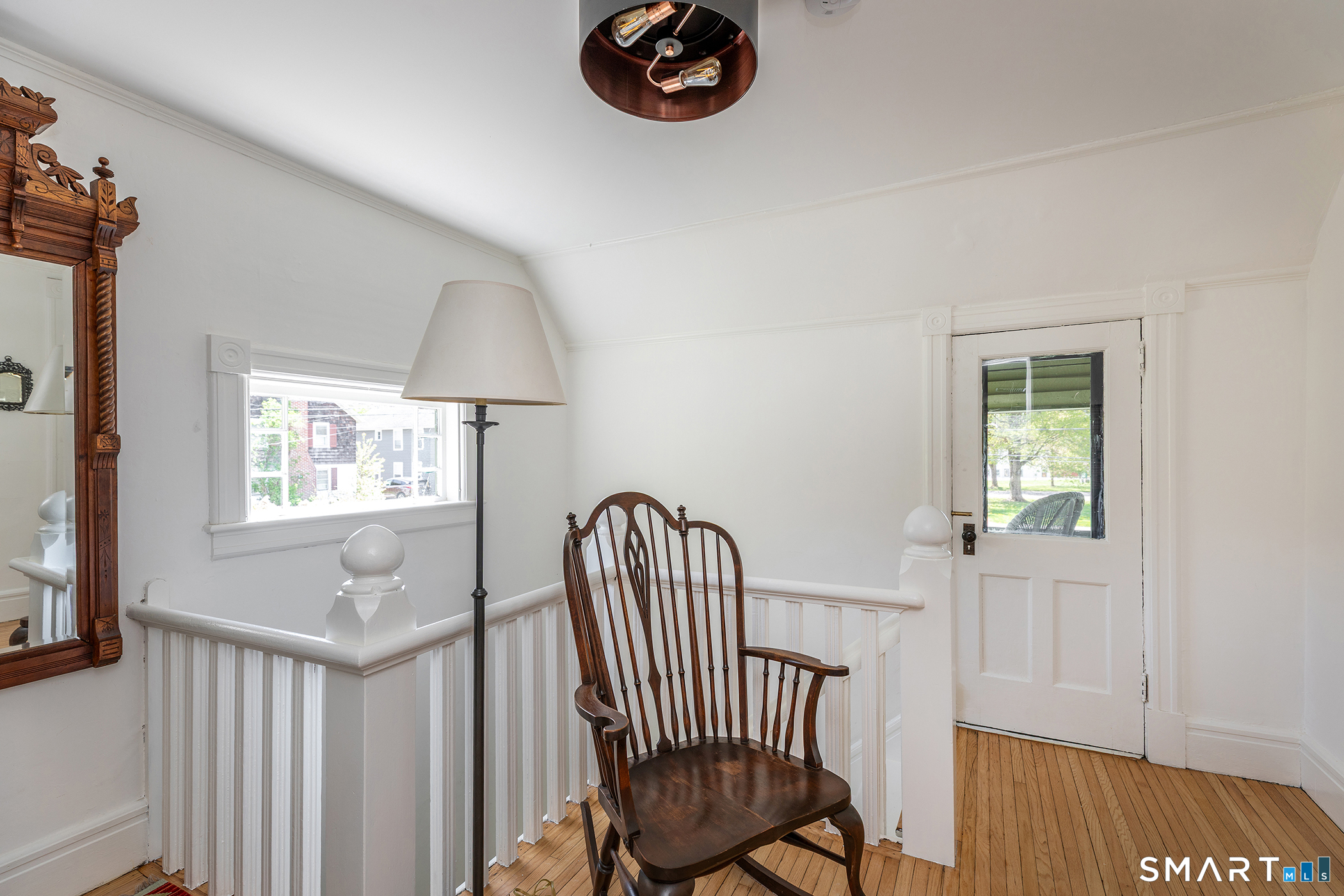 35 Maple Avenue Norfolk, CT 06058 - Photo 22 of 40 a view of a bedroom with furniture and wooden floor