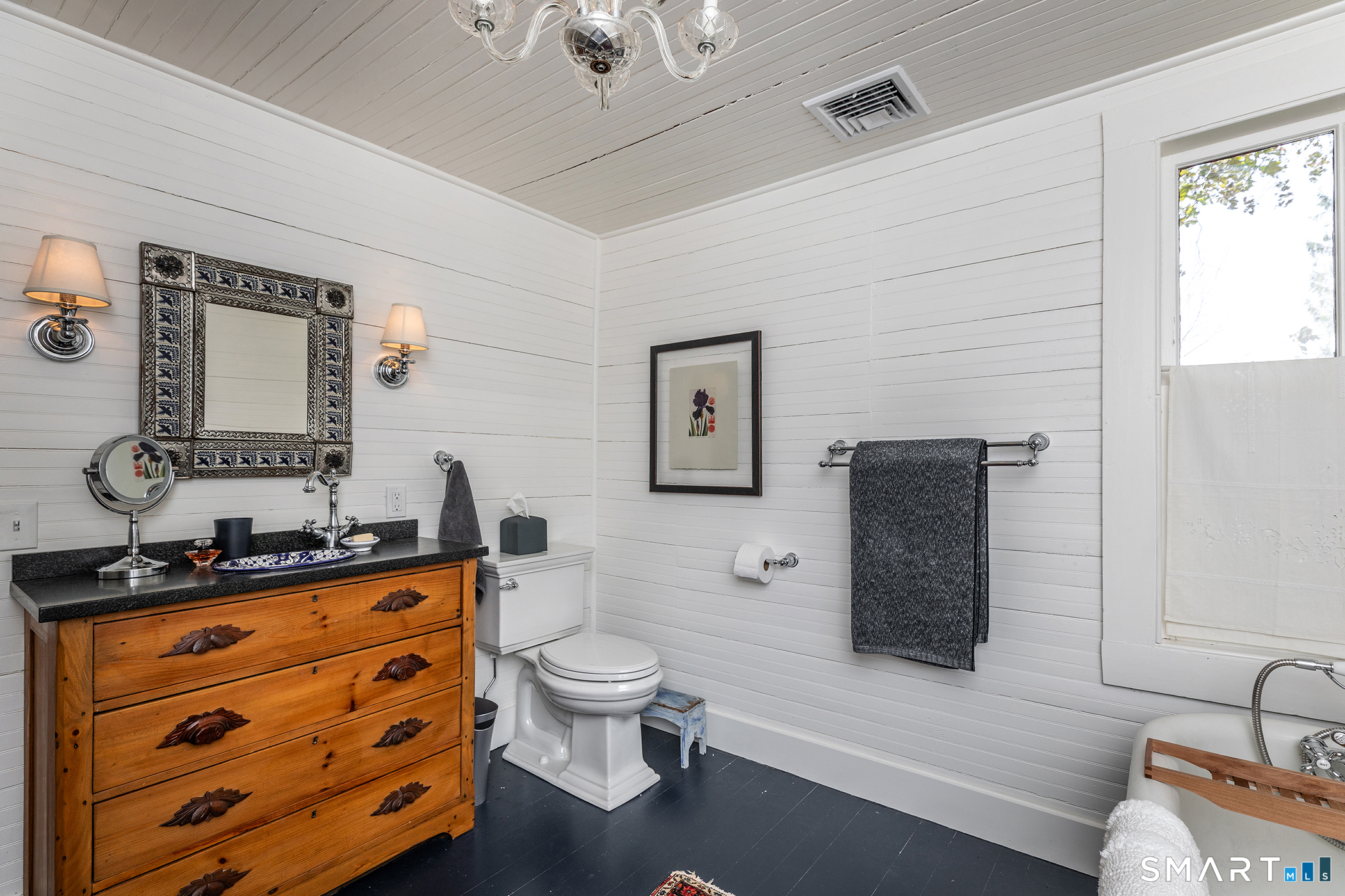 35 Maple Avenue Norfolk, CT 06058 - Photo 26 of 40 a bathroom with a toilet sink and mirror