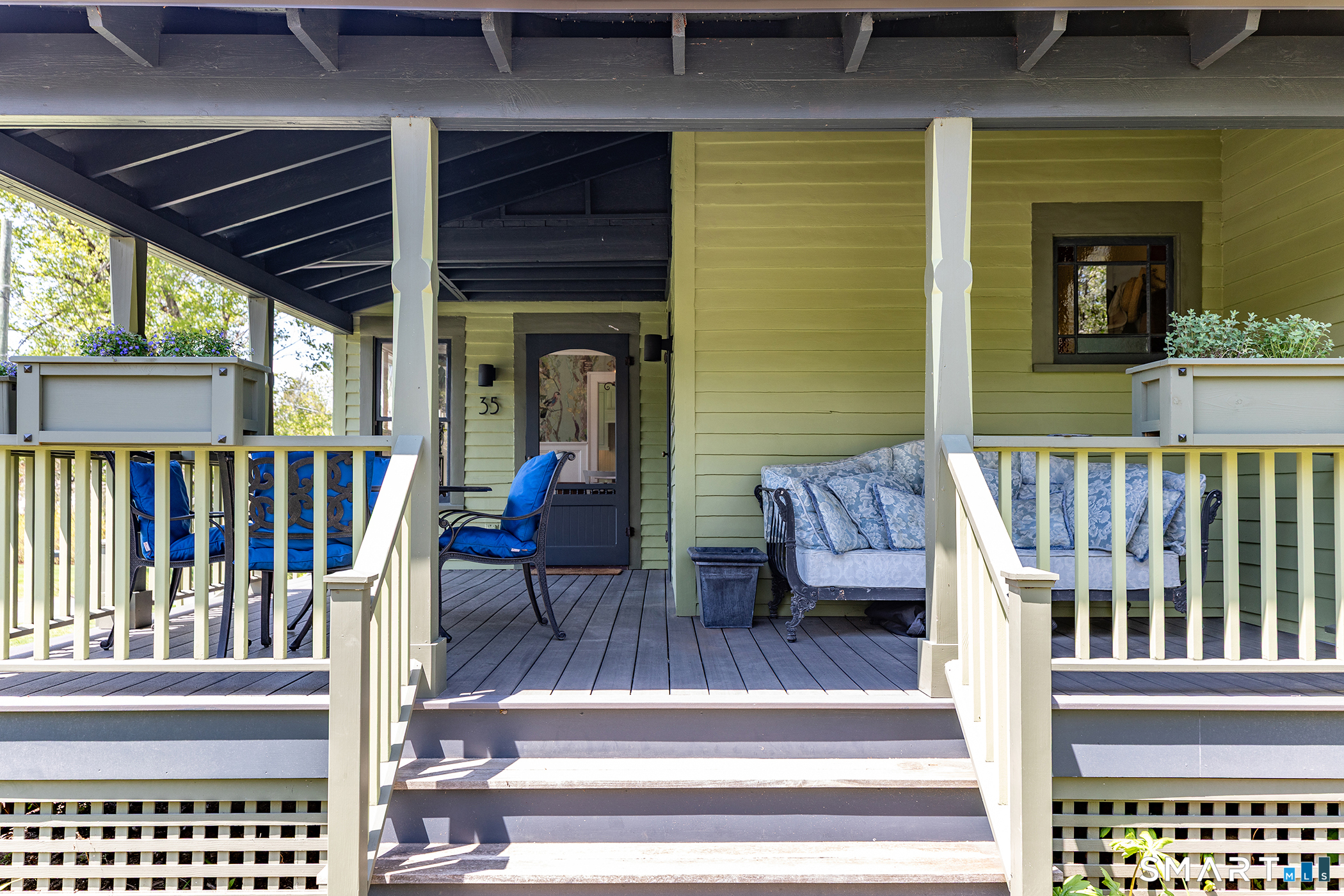 35 Maple Avenue Norfolk, CT 06058 - Photo 3 of 40 a view of a balcony with chairs and wooden floor