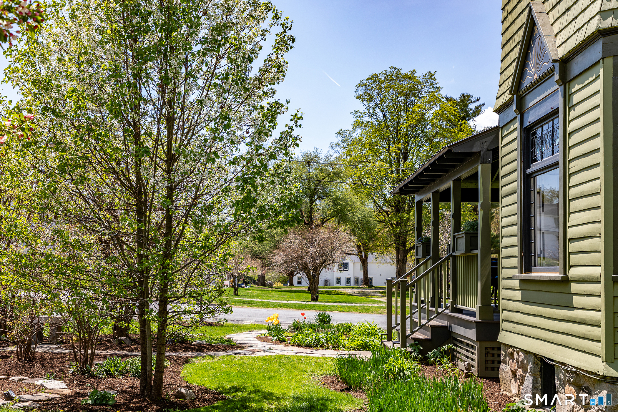 35 Maple Avenue Norfolk, CT 06058 - Photo 37 of 40 a view of a house with a yard