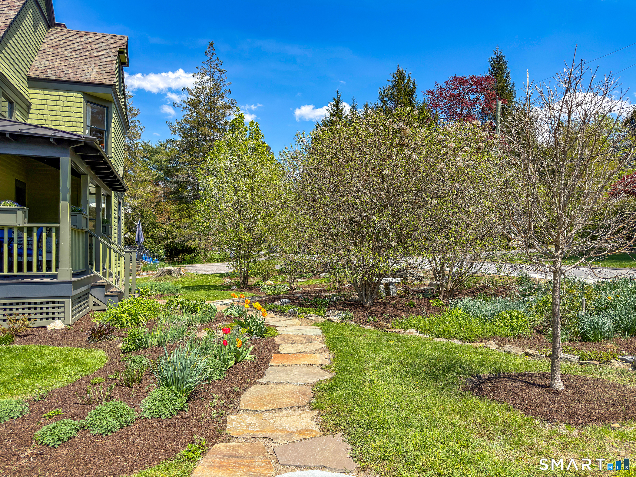 35 Maple Avenue Norfolk, CT 06058 - Photo 38 of 40 a view of a pathway of a house with a yard