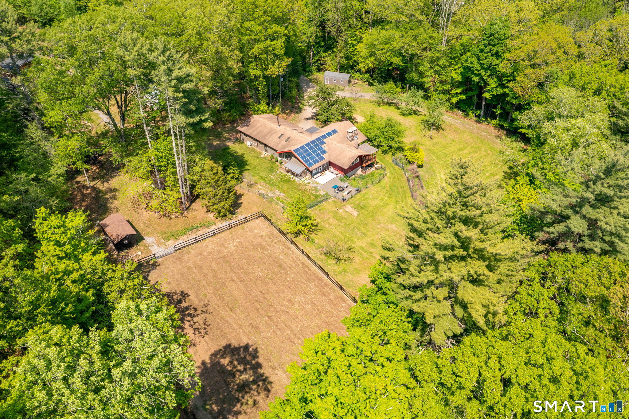 250 Center Hill Road Barkhamsted, CT 06063 - Photo 3 of 40 an aerial view of residential house with swimming pool and lawn chairs