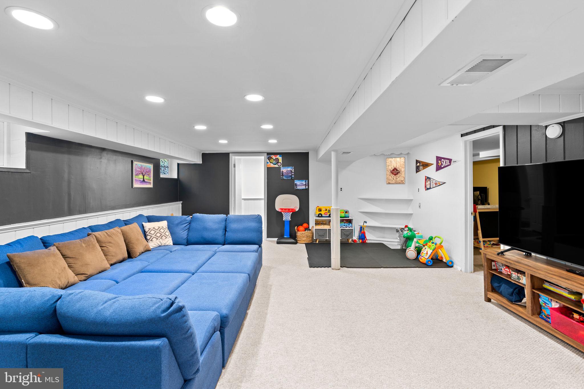 10310 Brunswick Avenue Silver Spring, MD 20902 - Photo 27 of 43 Spacious, modern basement retreat.