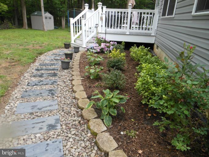 3563 Edgemont Street Edgewater, MD 21037 - Photo 8 of 22 Stone walkway from driveway to back deck