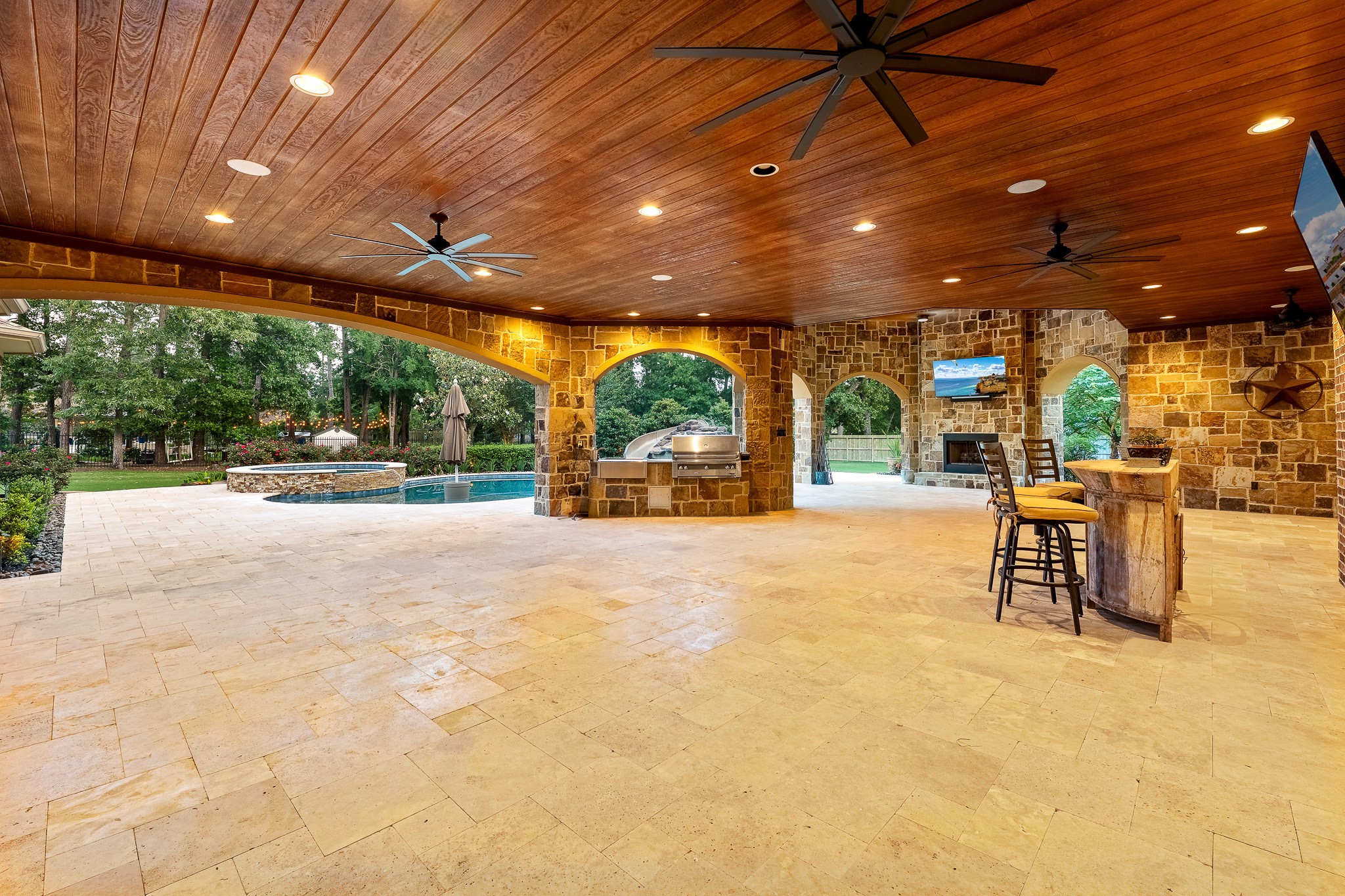 28002 Whispering Maple Way Spring, TX 77386 - Photo 40 of 44 a view of a swimming pool with outdoor seating