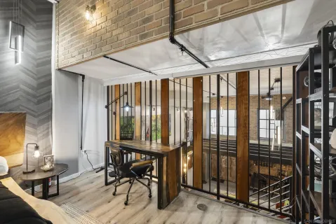 a kitchen with stainless steel appliances kitchen island granite countertop a stove and a sink