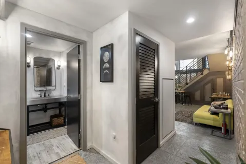 a kitchen with stainless steel appliances granite countertop a sink and a stove