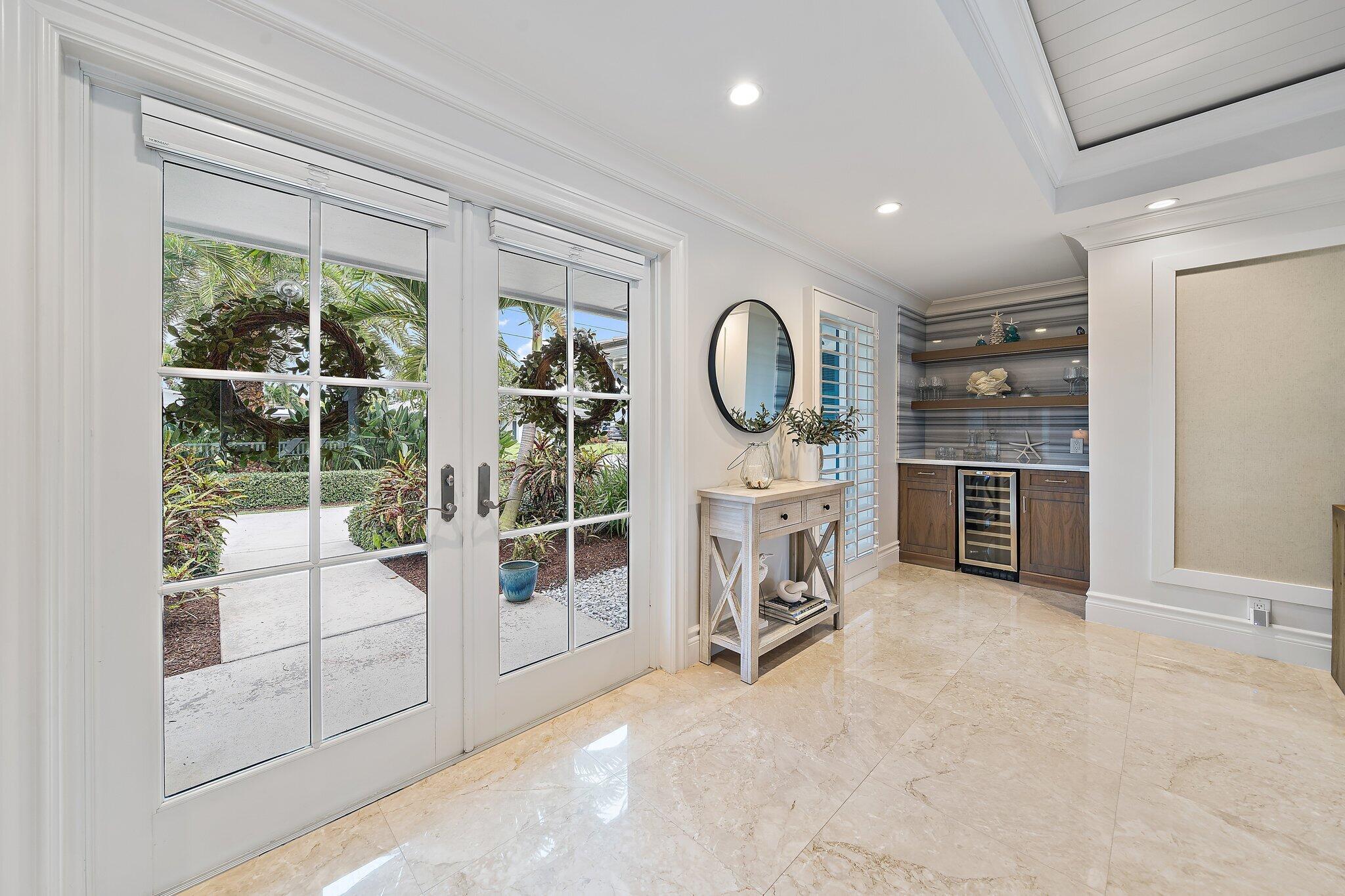 98 Golfview Drive Tequesta, FL 33469 - Photo 2 of 34 a view of a livingroom with furniture and window
