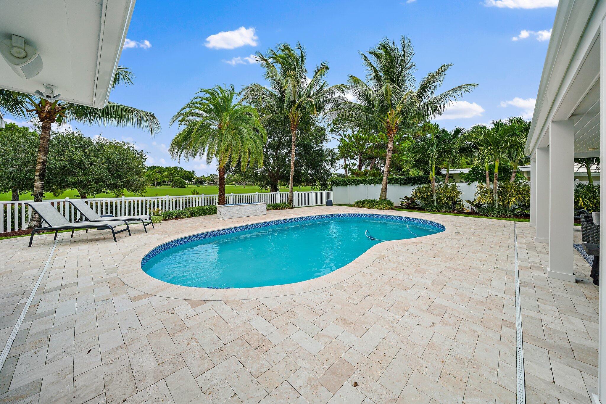 98 Golfview Drive Tequesta, FL 33469 - Photo 25 of 34 a view of outdoor space yard and swimming pool