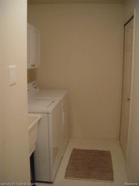 1836 Flagstone Circle, Unit 43 Rochester, MI 48307 - Photo 13 of 18 LAUNDRY RM, CABINETS, CLOSET