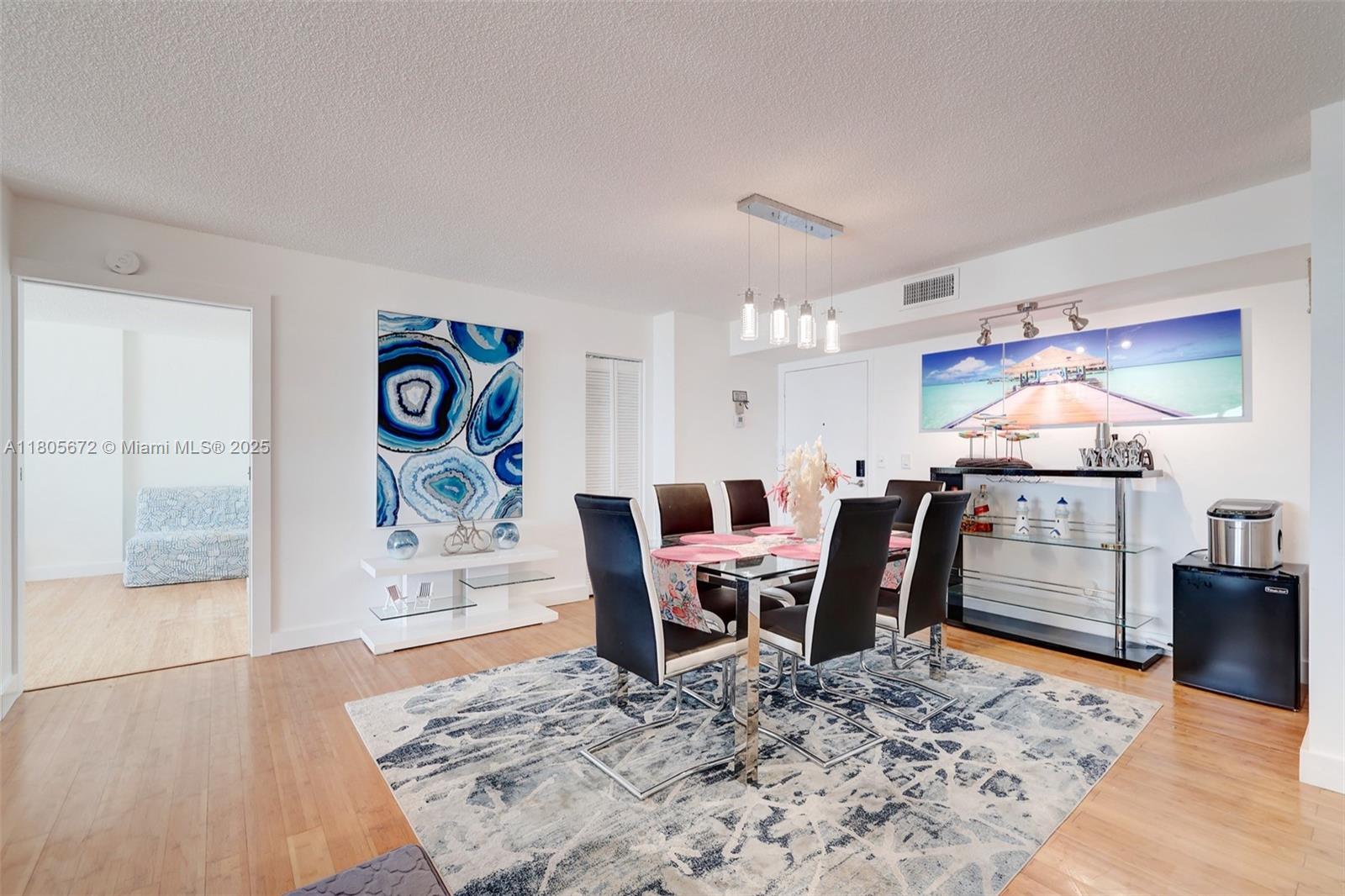 1500 South Ocean Drive, Unit 7J Hollywood, FL 33019 - Photo 13 of 54 a living room with furniture and wooden floor