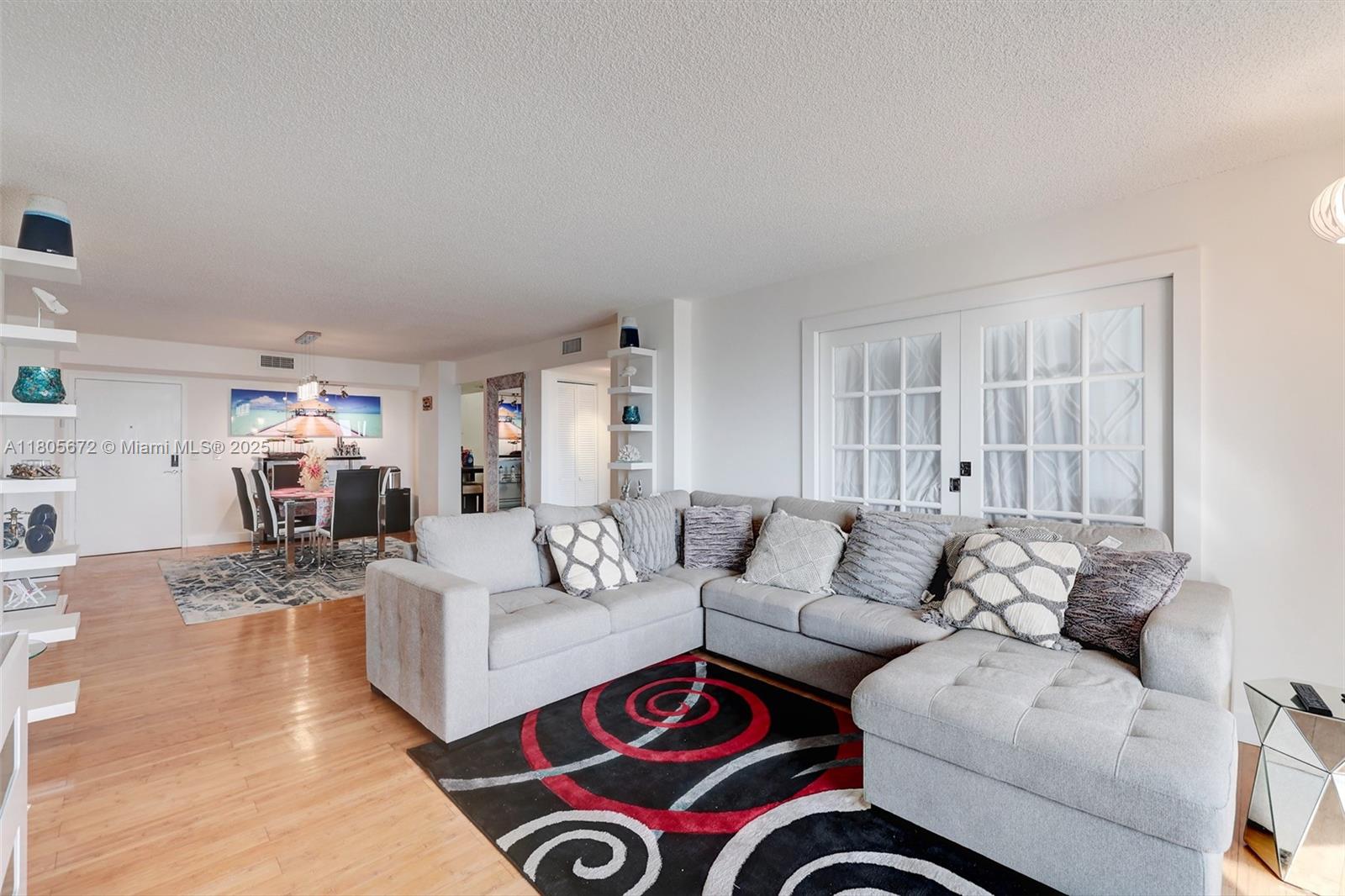 1500 South Ocean Drive, Unit 7J Hollywood, FL 33019 - Photo 19 of 54 a living room with furniture and a wooden floor