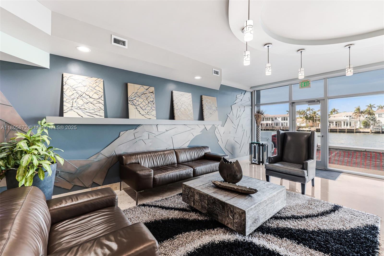 1500 South Ocean Drive, Unit 7J Hollywood, FL 33019 - Photo 8 of 54 a living room with furniture and a chandelier