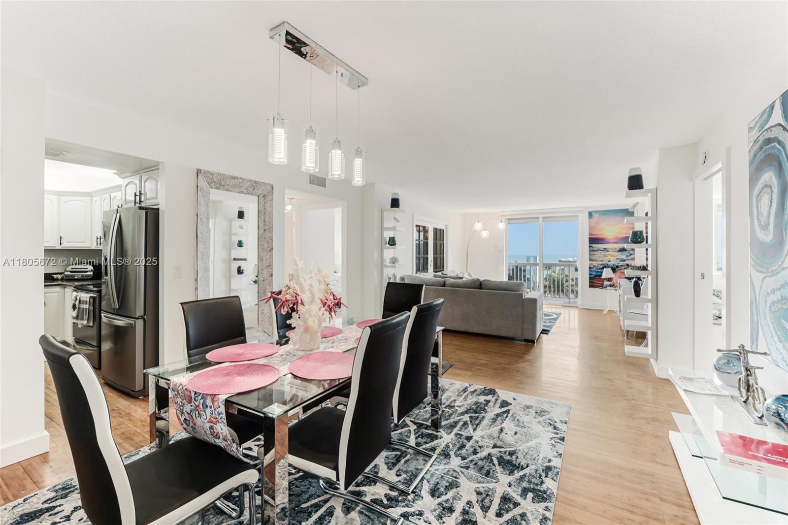 1500 South Ocean Drive, Unit 7J Hollywood, FL 33019 - Photo 9 of 54 a view of a dining room with furniture and a rug