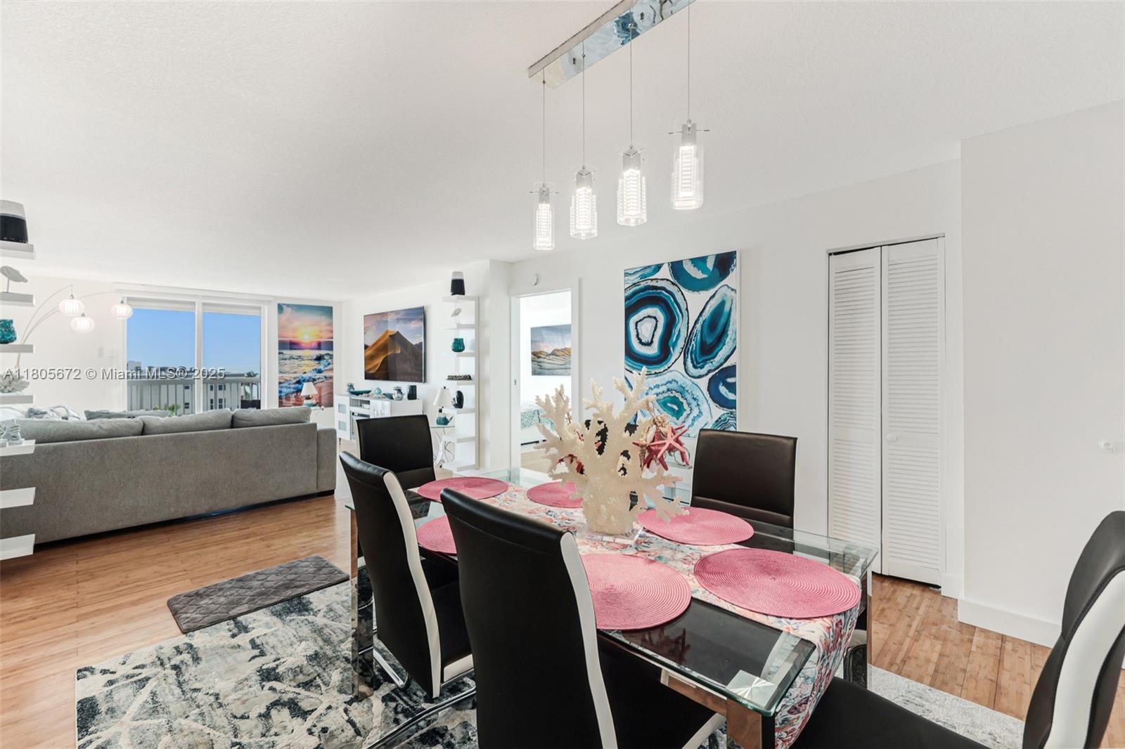 1500 South Ocean Drive, Unit 7J Hollywood, FL 33019 - Photo 10 of 54 a dining room with furniture and wooden floor