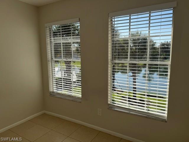 153 Santa Clara Drive, Unit 10 Naples, FL 34104 - Photo 25 of 33 a view of a room that has a window in it