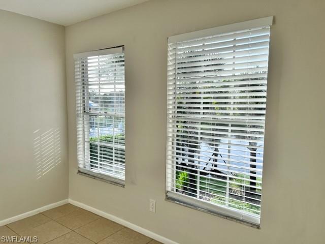 153 Santa Clara Drive, Unit 10 Naples, FL 34104 - Photo 7 of 33 a view of a room that has a window