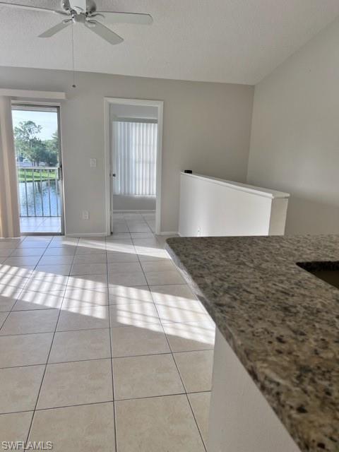 153 Santa Clara Drive, Unit 10 Naples, FL 34104 - Photo 10 of 33 a view of an empty room and window