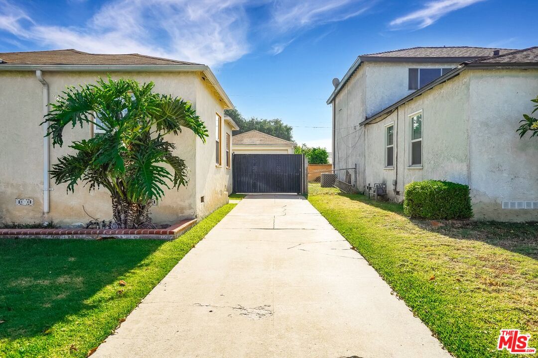 1316 South Castlegate Avenue Compton, CA 90221 - Photo 21 of 28 a view of a back yard of the house