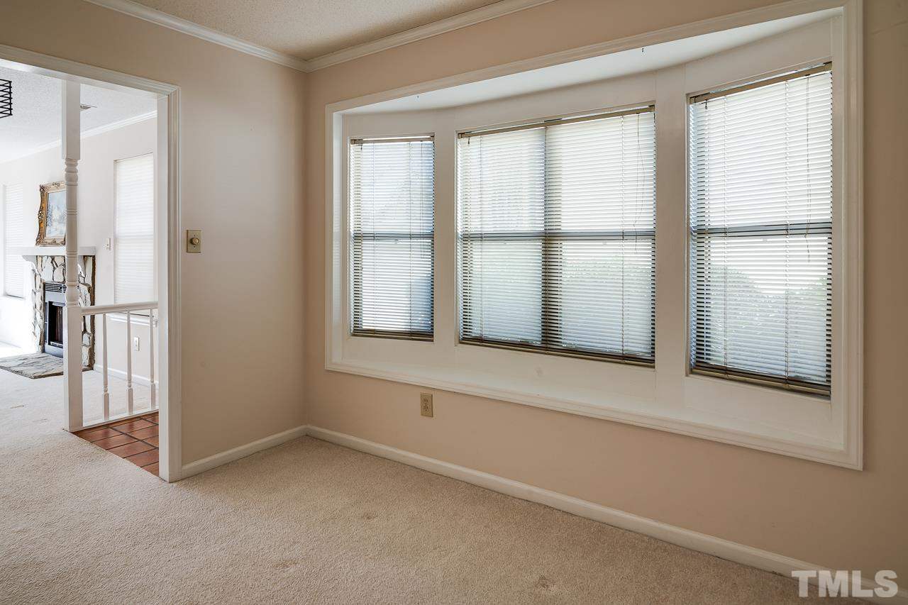 5429 Pine Top Circle Raleigh, NC 27612 - Photo 14 of 24 The value of an end unit...bay window in dining room.