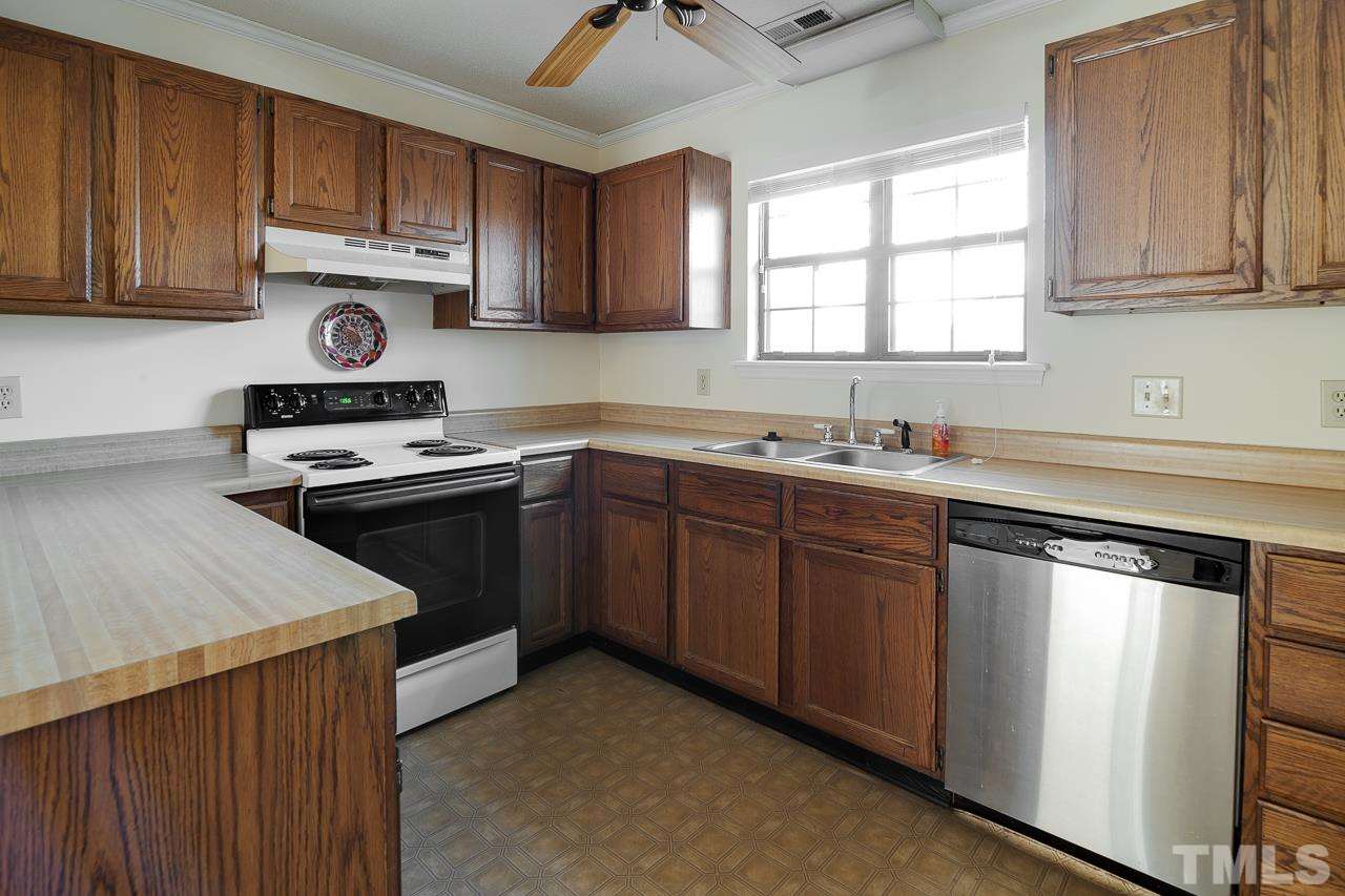 5429 Pine Top Circle Raleigh, NC 27612 - Photo 15 of 24 Kitchen designed for easy clean up.