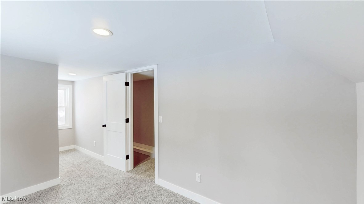 2978 Long Road Uniontown, OH 44685 - Photo 38 of 40 Spare room featuring light colored carpet and recessed lighting