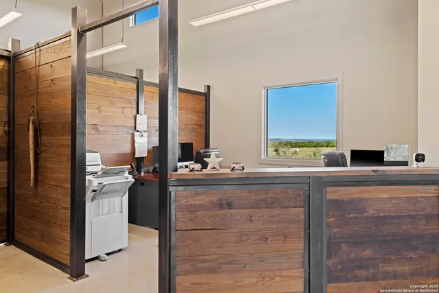 a kitchen with a refrigerator and a sink