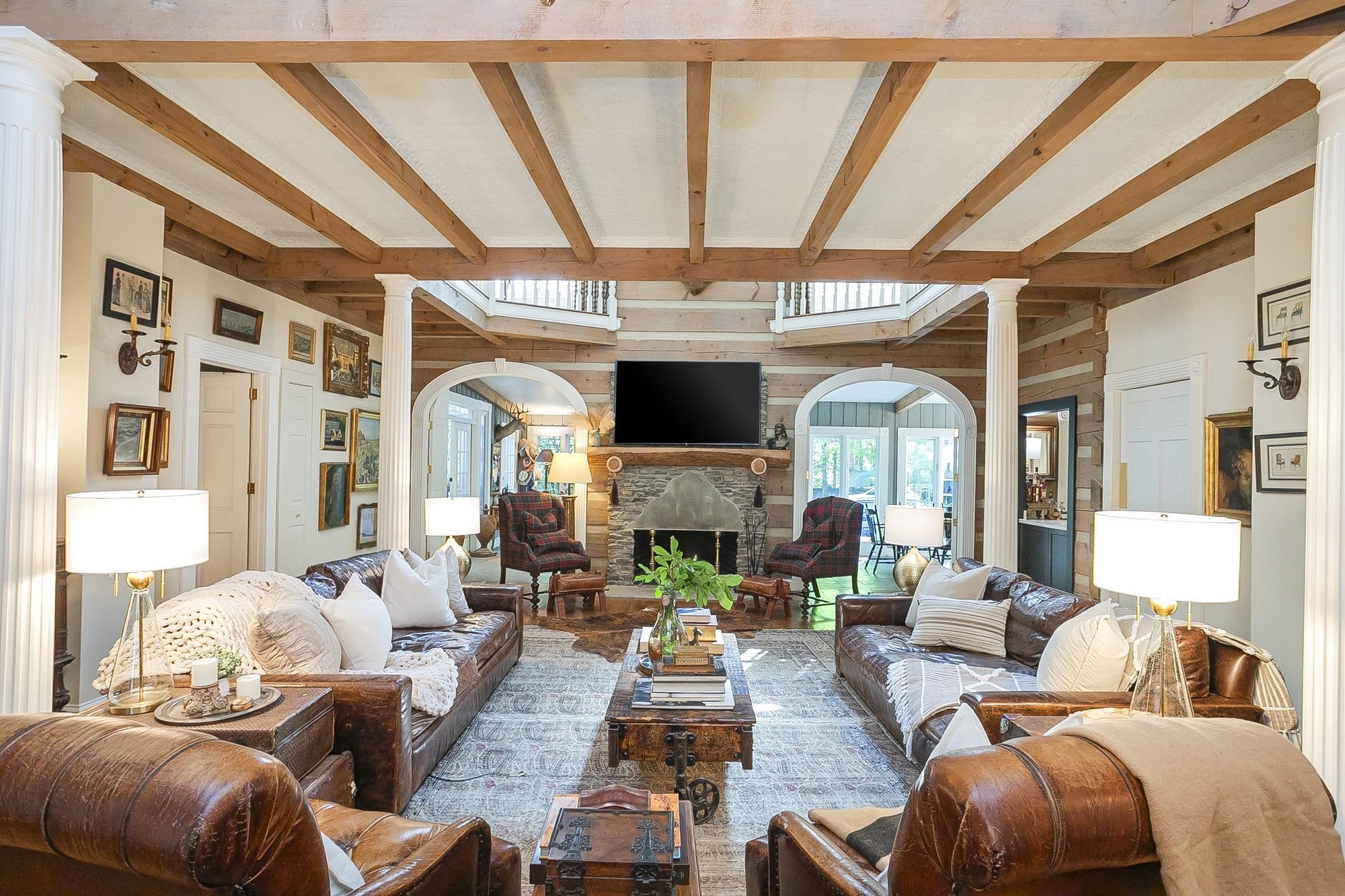 1105 Mt Pleasant Road Kingston Springs, TN 37082 - Photo 12 of 97 a living room with furniture a fireplace and a flat screen tv
