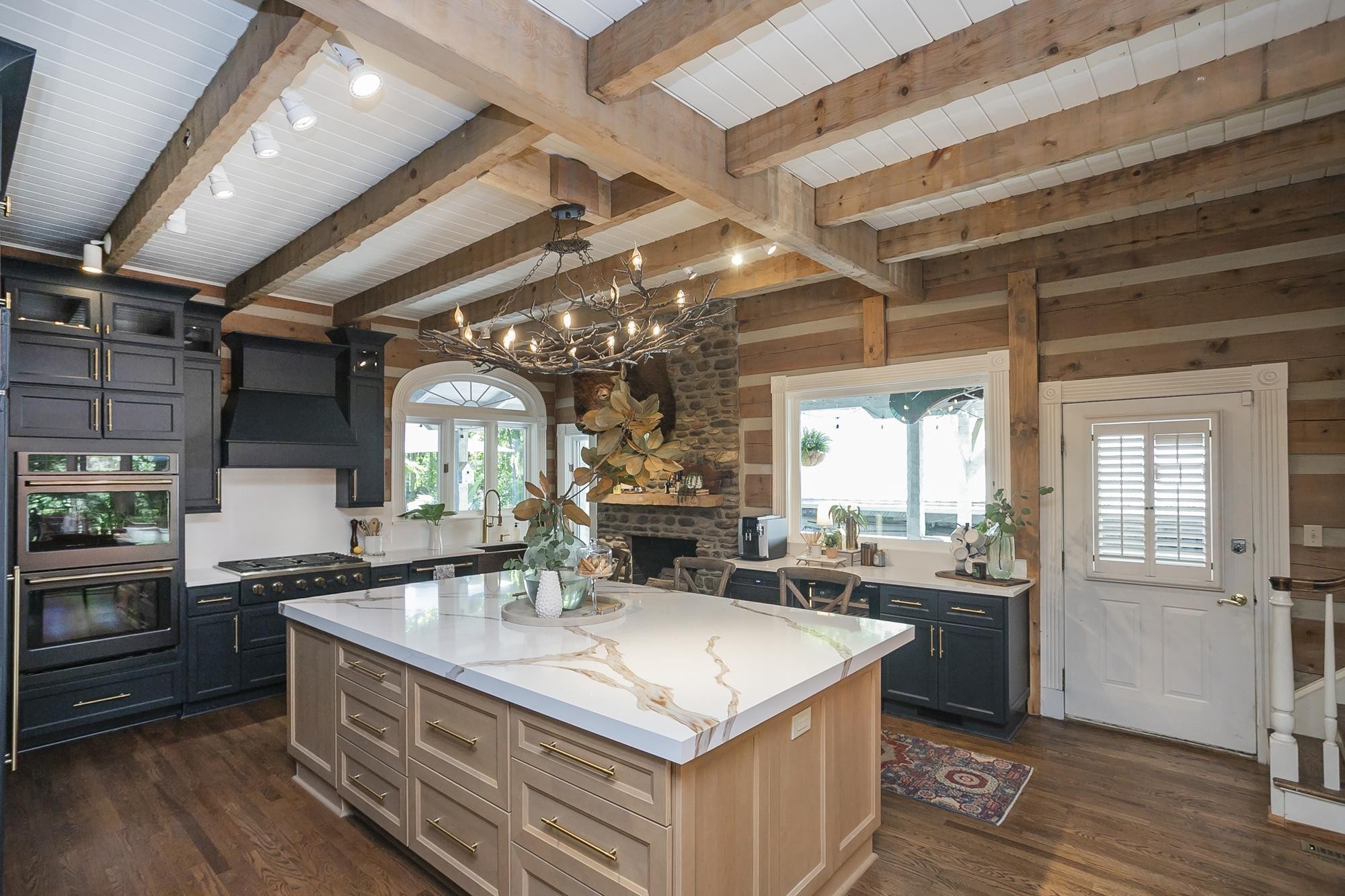 1105 Mt Pleasant Road Kingston Springs, TN 37082 - Photo 15 of 97 a kitchen with stainless steel appliances granite countertop a sink a stove and a wooden floors